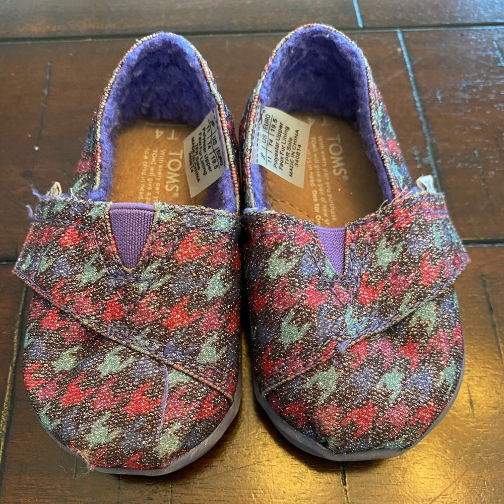 Tom's furry shoes.